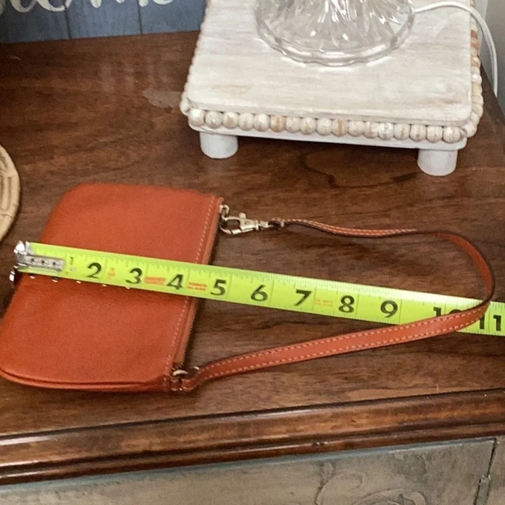 Michael Kors orange, gold tone Studded wristlet, clutch, zipper pouch